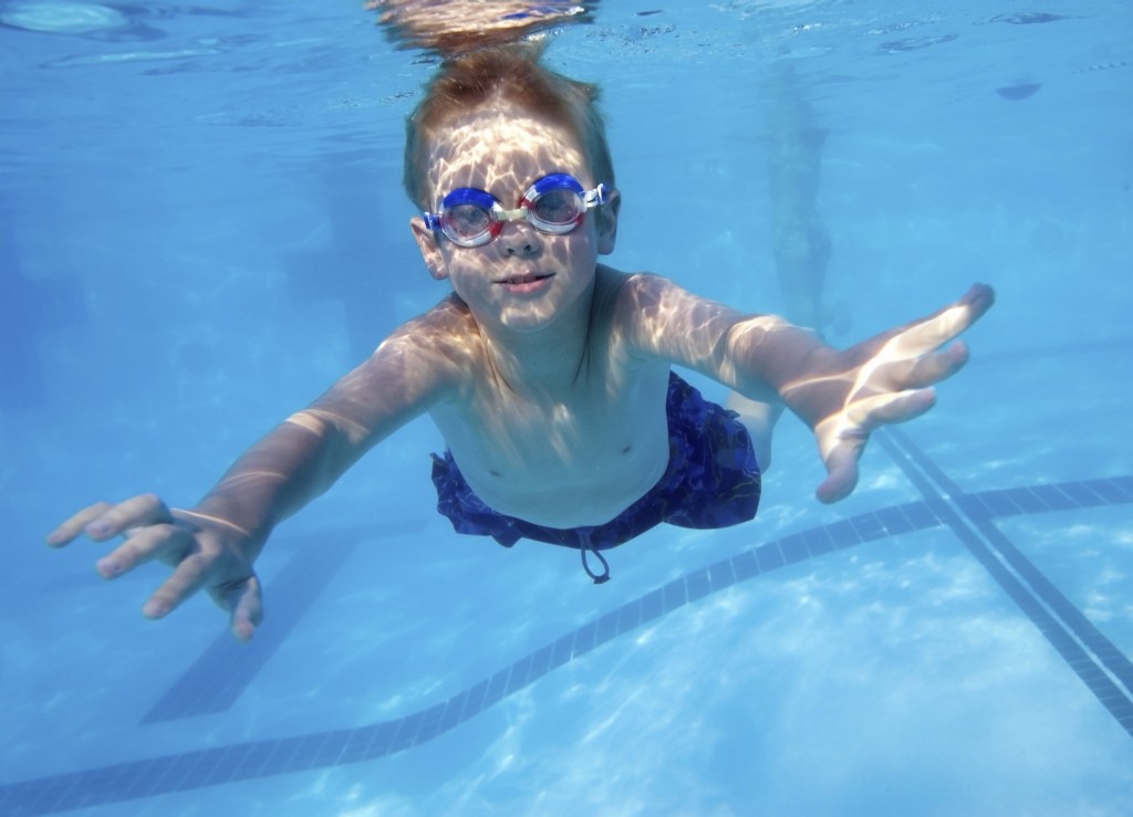 Boy swimming underwater