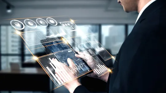 persona-trabajando-con-una-tablet-donde-salen-graficos-y-hace-un-buen-uso-de-la-etica-de-la-inteligencia-artificial