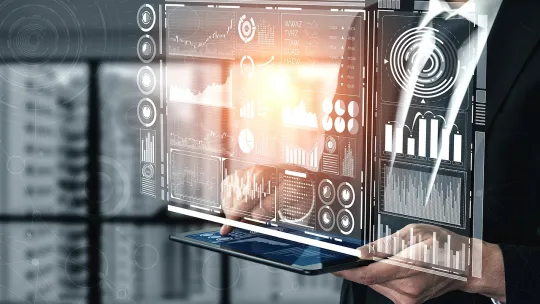 diseno-de-una-persona-con-una-tablet-en-la-mano-donde-sale-de-la-pantalla-graficos-simulando-lo-que-puede-hacer-la-inteligencia-artificial-en-colombia