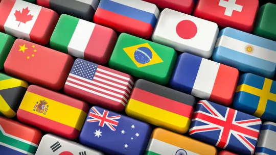 tendencias-emergentes teclado-con-banderas-de-distintos-paises-que-representan-las-tendencias-emergentes-en-la-traduccion